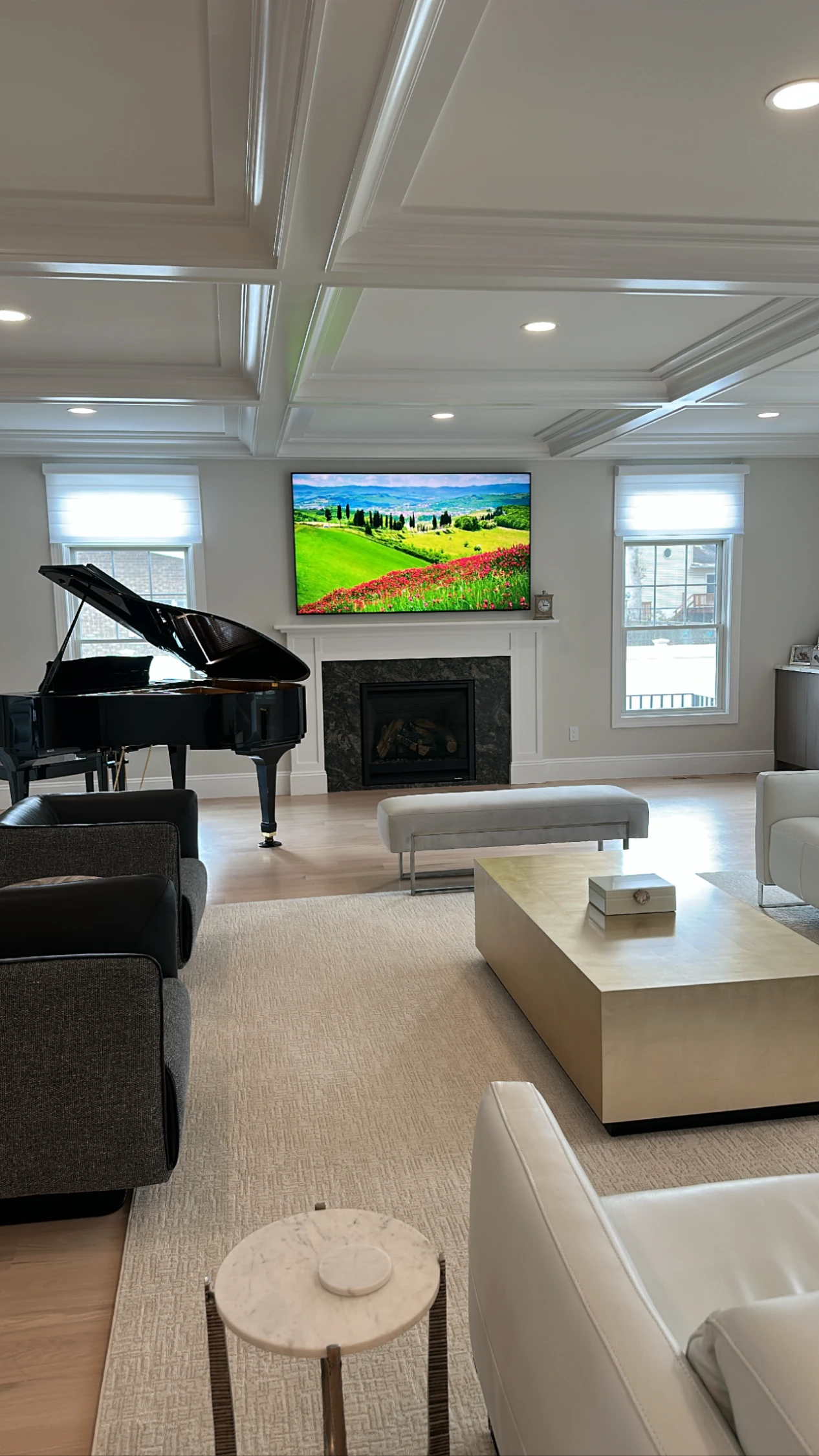 Modern family room with TV and piano