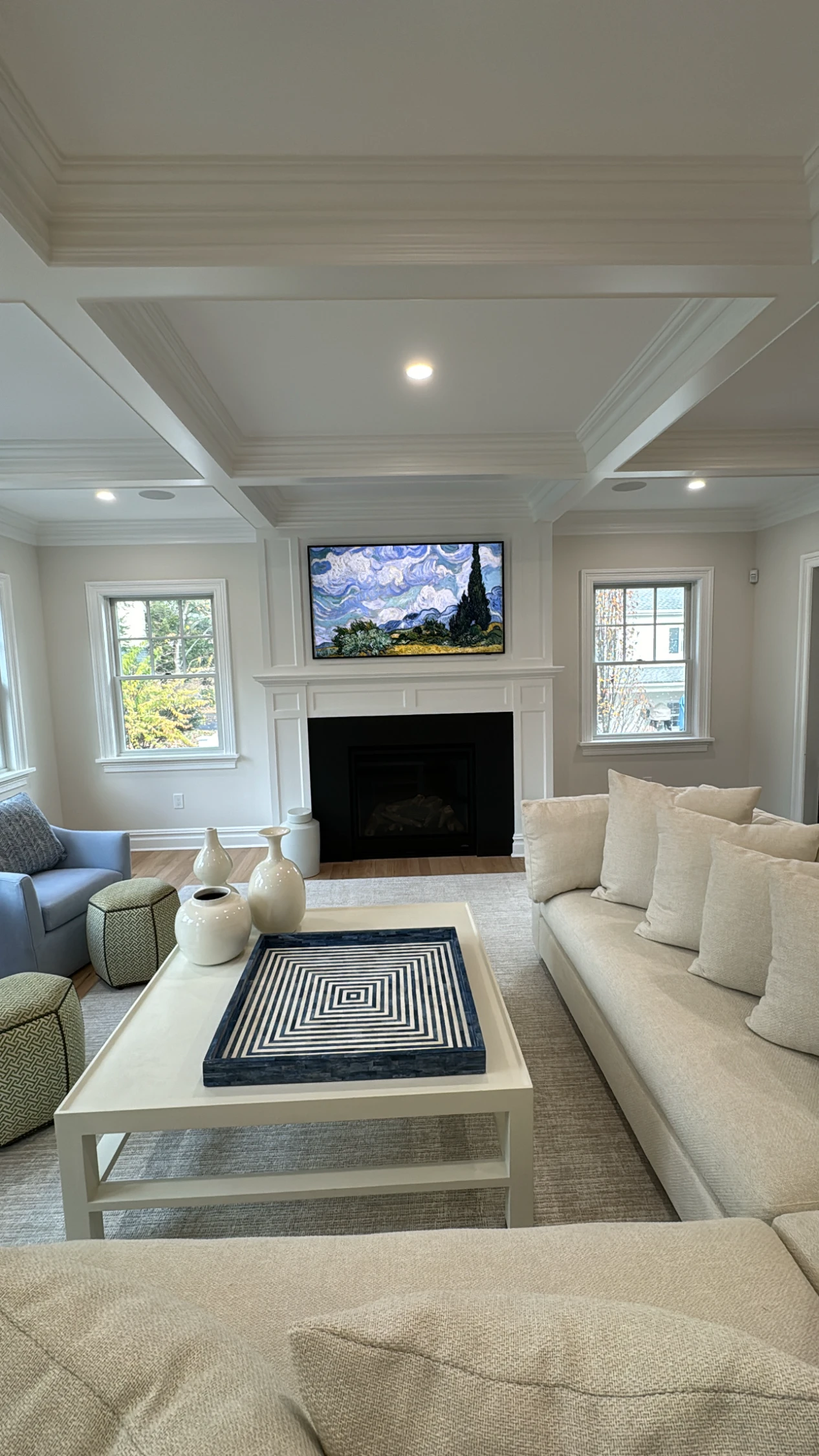 Comfortable modern family room with mounted TV