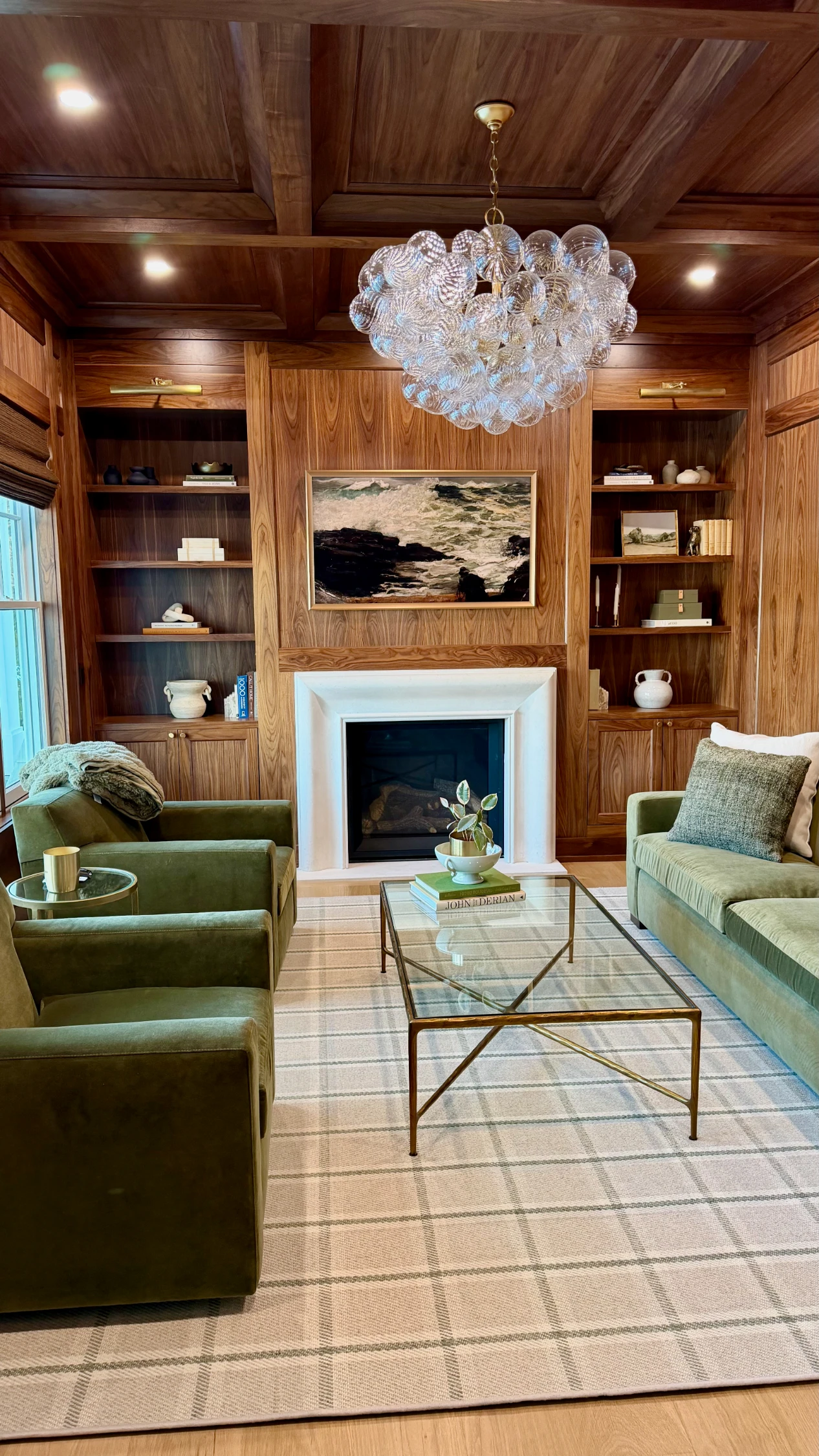 TV installation in a cozy reading room with wood paneling